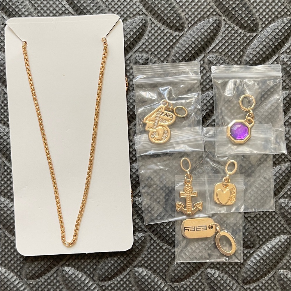 [FREE] Gold necklace w/ charms.